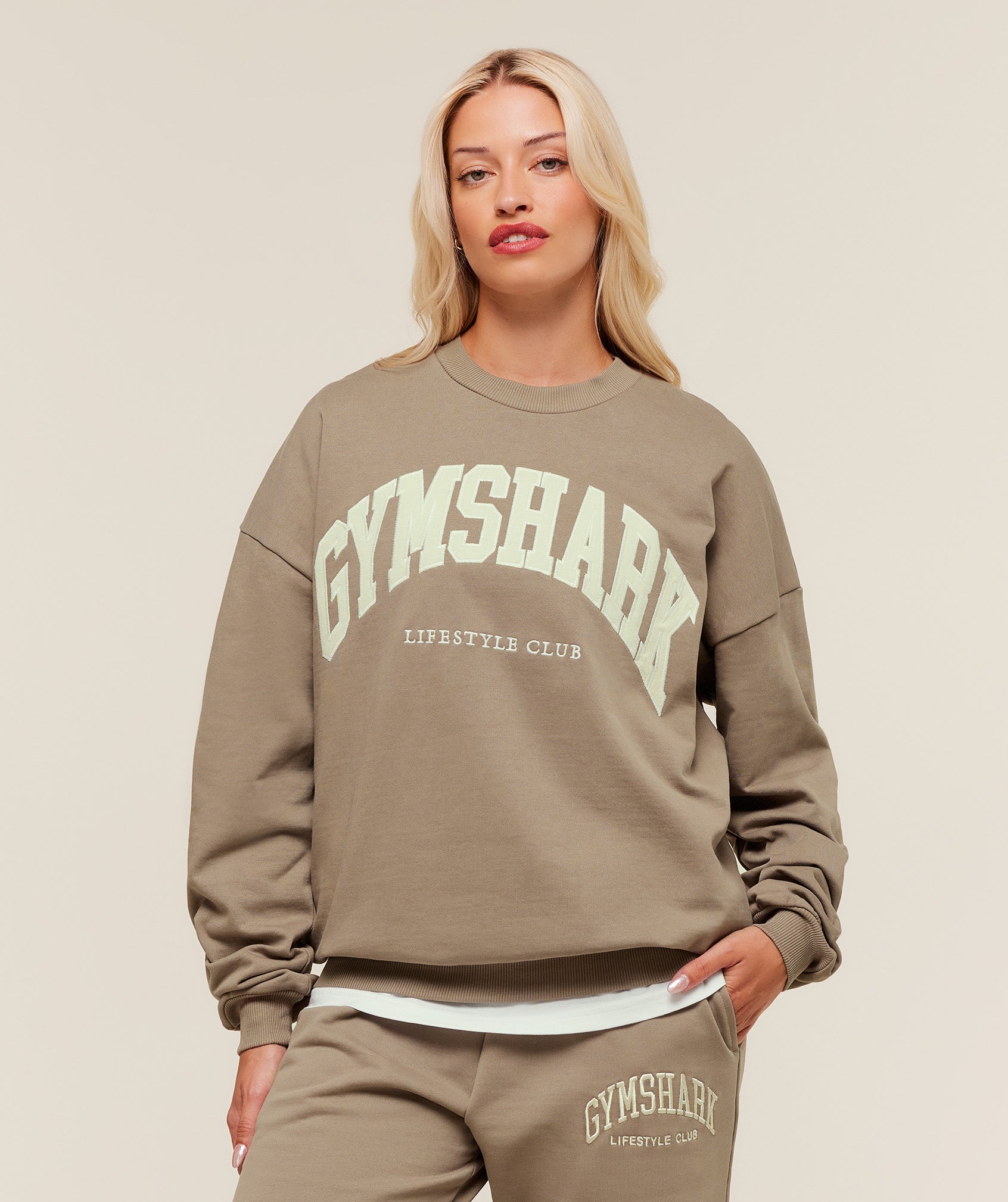 gymshark collegiate graphic crew neck pullover lifestyle brown gymshark collegiate graphic crew neck pullover lifestyle brown