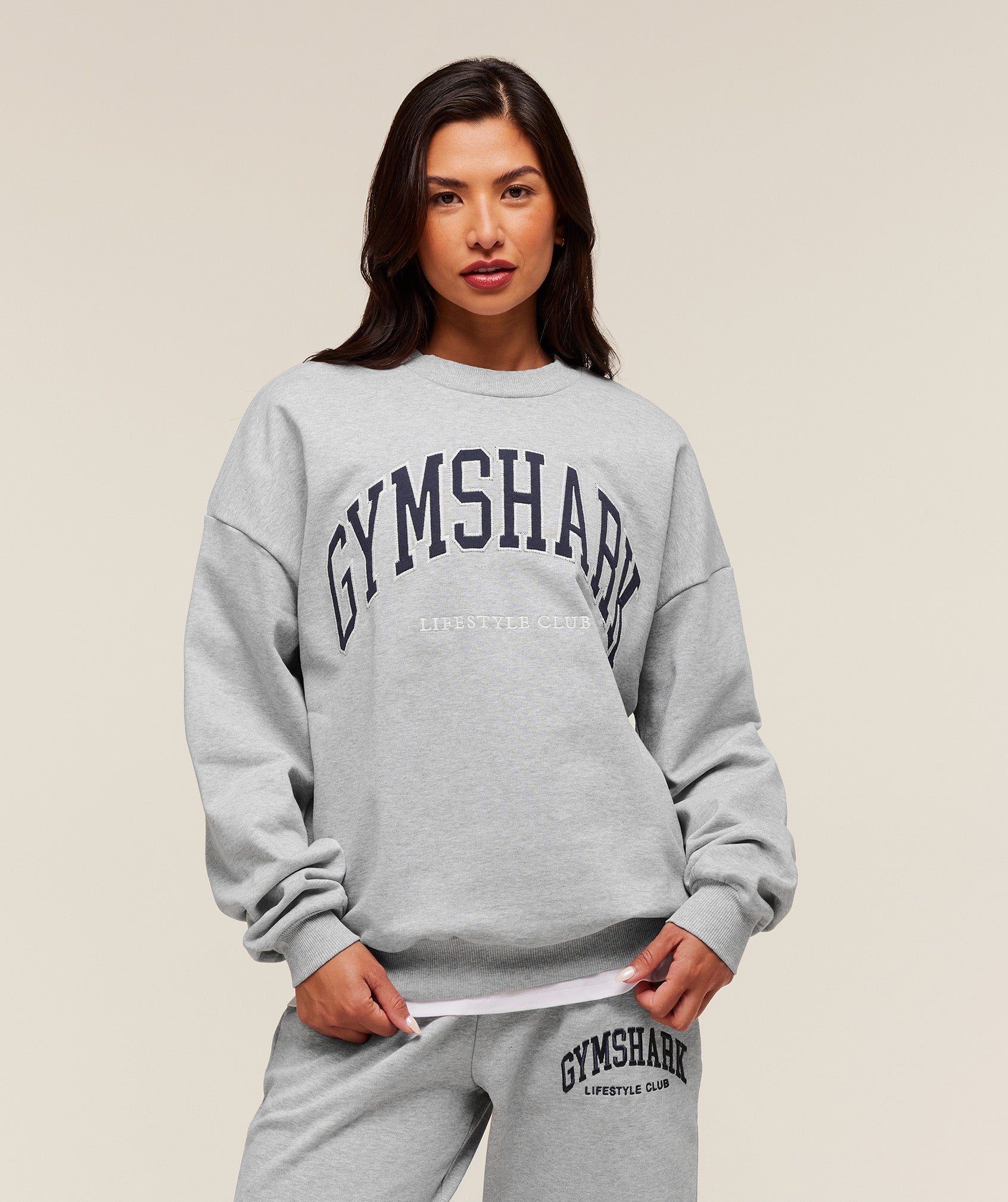 gymshark collegiate graphic crew neck pullover light grey core marl gymshark collegiate graphic crew neck pullover light grey core marl